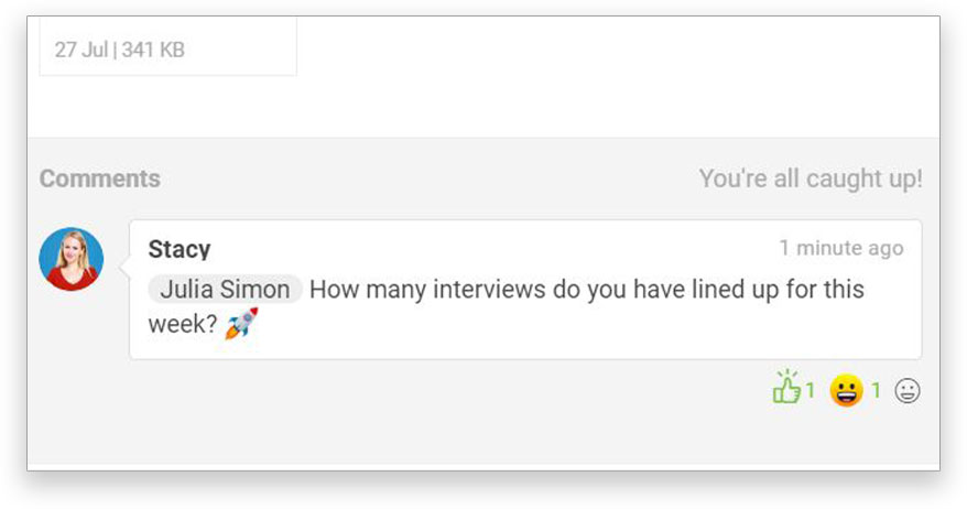 Screenshot of ProjectManager.com's task view, showing team members collaborating by commenting on the task