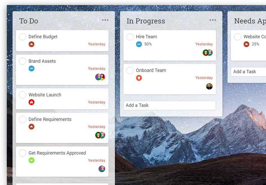 A screenshot of ProjectManager.com’s kanban board, which has many tasks as cards and boards that represent different stages of completion