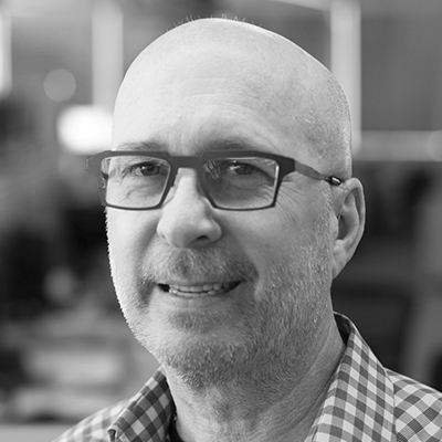 Photograph of Kevin Riegelsberger, CEO of ProjectManager.com