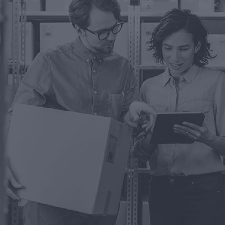 Image of two workers going over a product design
